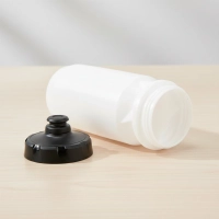 Botella profesional de Ciclismo 600 ml exprimible, tapa doble succion