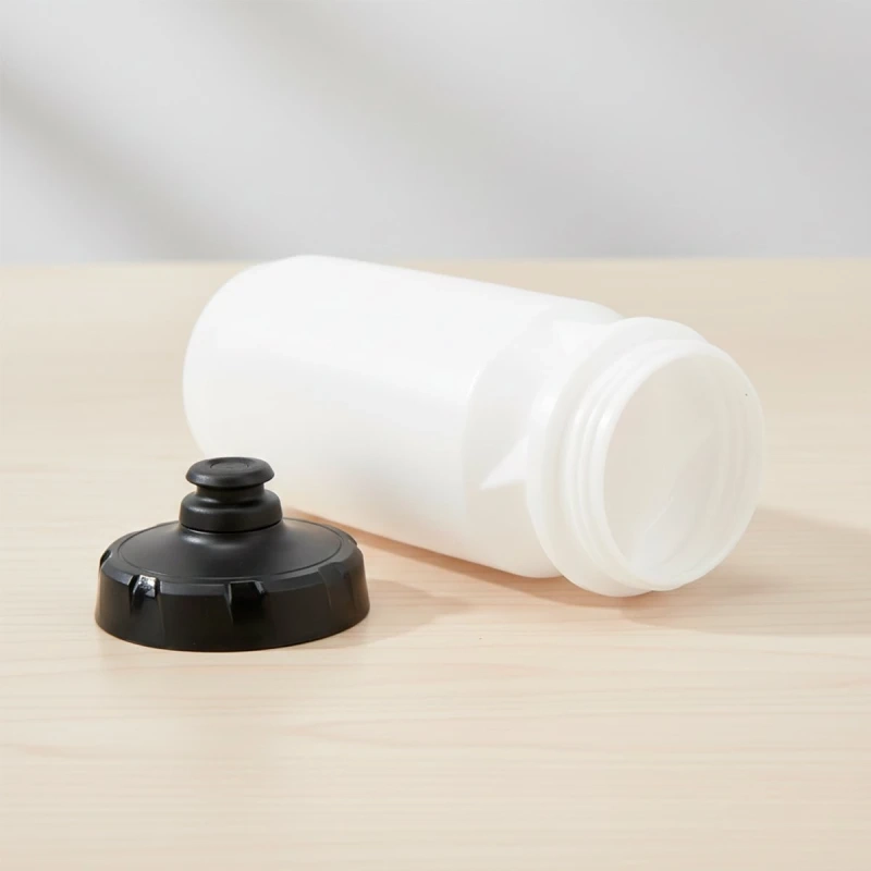 Botella profesional de Ciclismo 600 ml exprimible, tapa doble succion