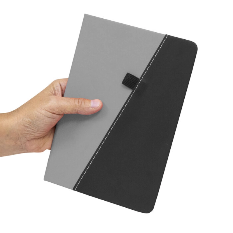 Libreta con caratula en cuerina bicolor, 80 hojas, tamaño 14.5 x 21 x 1.5 cm